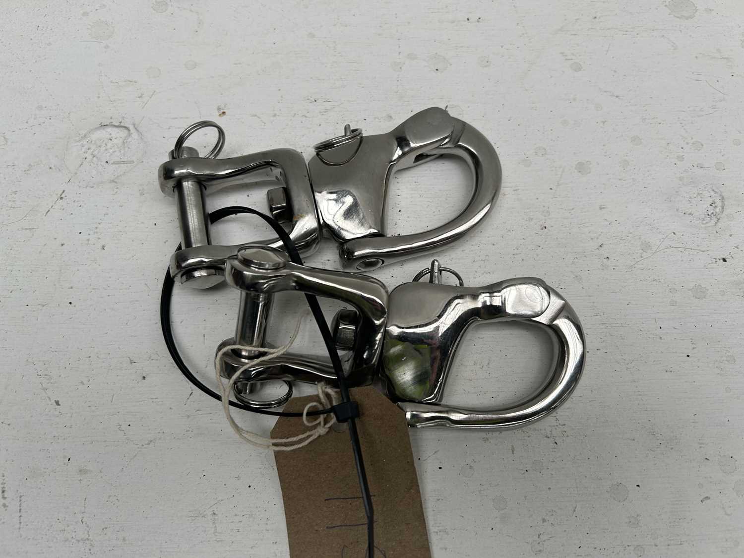 Lot 1154 - Pair of quick release snaps. This lot