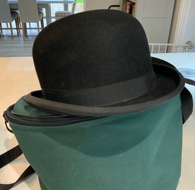 Lot 1180 - Christies black bowler hat with case, size 7