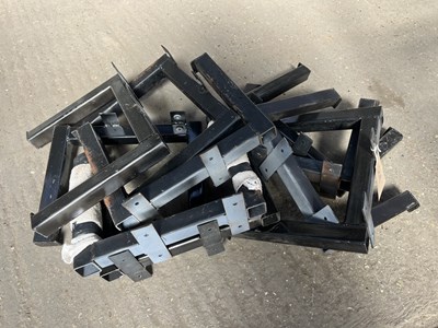 Lot 1248 - Ten black painted metal homemade harness racks