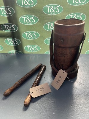 Lot 1253 - Leather bucket, impressed with the letter N; together with a Rutters horse twitch
