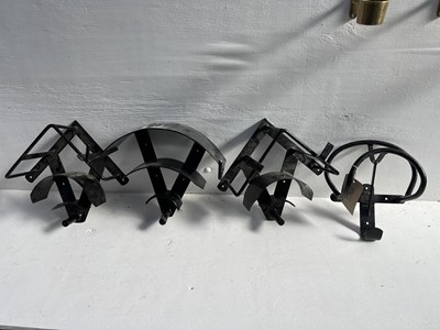 Lot 1256 - Four assorted harness brackets