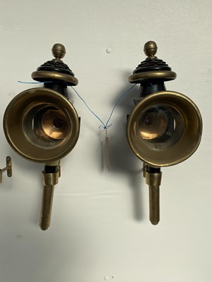 Lot 1262 - Pair of black and brass round-fronted carriage lamps, height 24"