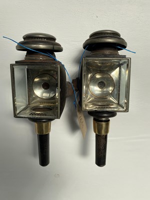 Lot 1264 - Pair of black and white metal carriage lamps by C N Lockwood & Co. of Newark, New Jersey, height 17"