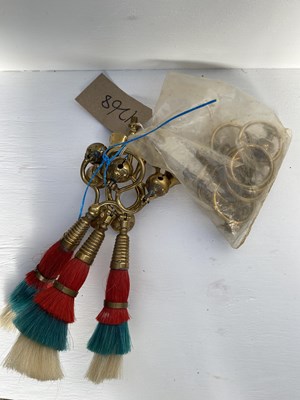 Lot 1268 - Three plumed bell terrets together with a quantity of brass harness fittings