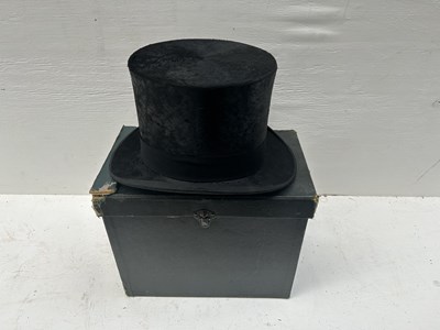 Lot 1272 - Black silk top hat by Herbert Johnson, 20cm x 16.5cm in a green hat box