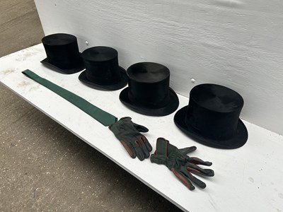 Lot 1273 - Four black silk top hats
