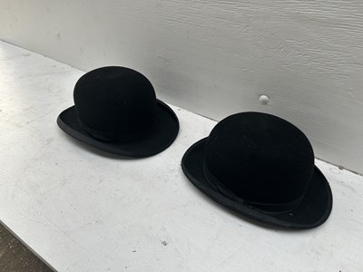 Lot 1276 - Black bowler hat by Dunn & Co. size 7 1/2 together with s black bowler hat by Locke & co., size 7 1/2