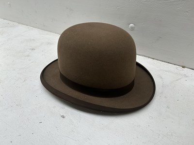 Lot 1279 - Brown bowler hat by Henry Heath, size 8 1/2