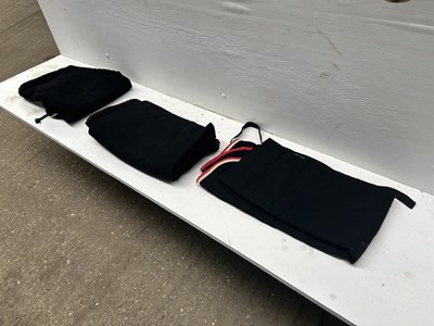 Lot 1285 - Three black driving aprons