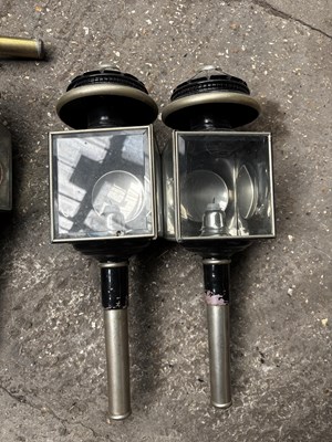 Lot 1318 - Two pairs of black and brass carriage lamps