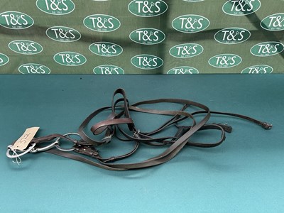 Lot 322 - Bridle with 7" stainless steel loose ring snaffle