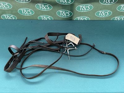 Lot 323 - Bridle with 6" stainless steel full cheek eggbutt snaffle