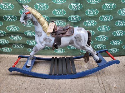 Lot 516 - Rocking Horse with saddle, measuring 4ft long, 31" high, 13.5" wide.