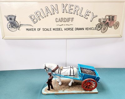 Lot 576 - Blue Kent Dung Cart Model (38x14x18)
