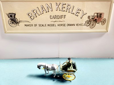 Lot 589 - Model of a Battlesden Cart, painted green with yellow wheels (32x14x18)