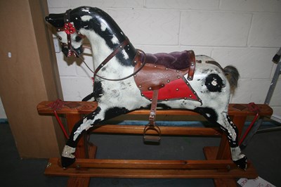 Lot 664 - Wooden rocking horse by Collinson