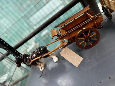 Lot 666 - Model of a two wheel agricultural cart in varnished wood, with shire horse and traditional harness