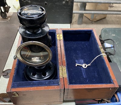 Lot 825 - Black painted metal and brass coachman's hand lamp