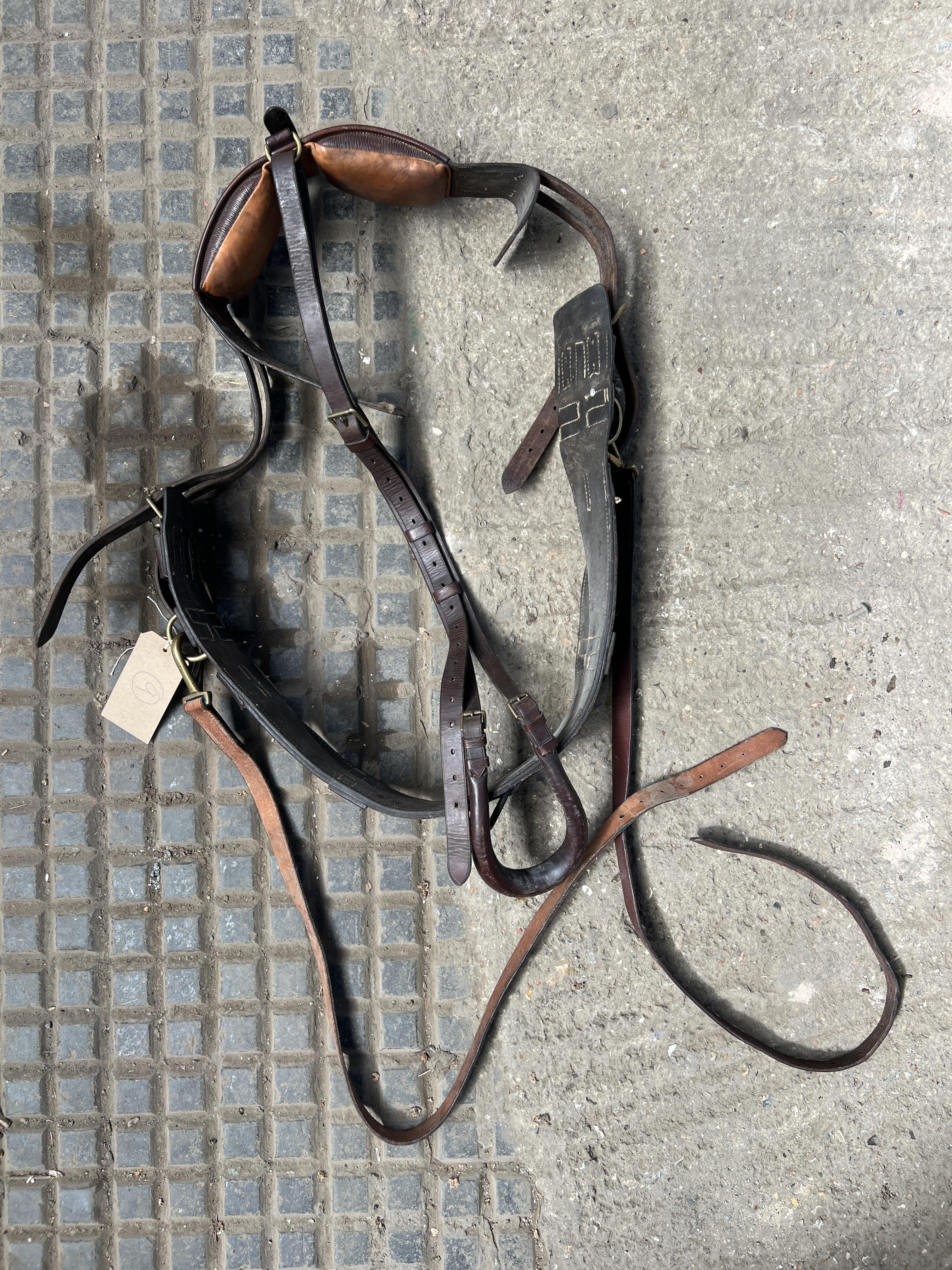Lot 854 - Brown leather breaking pad with brass