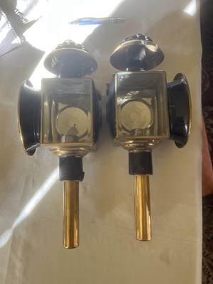 Lot 860 - Pair of brass lamps