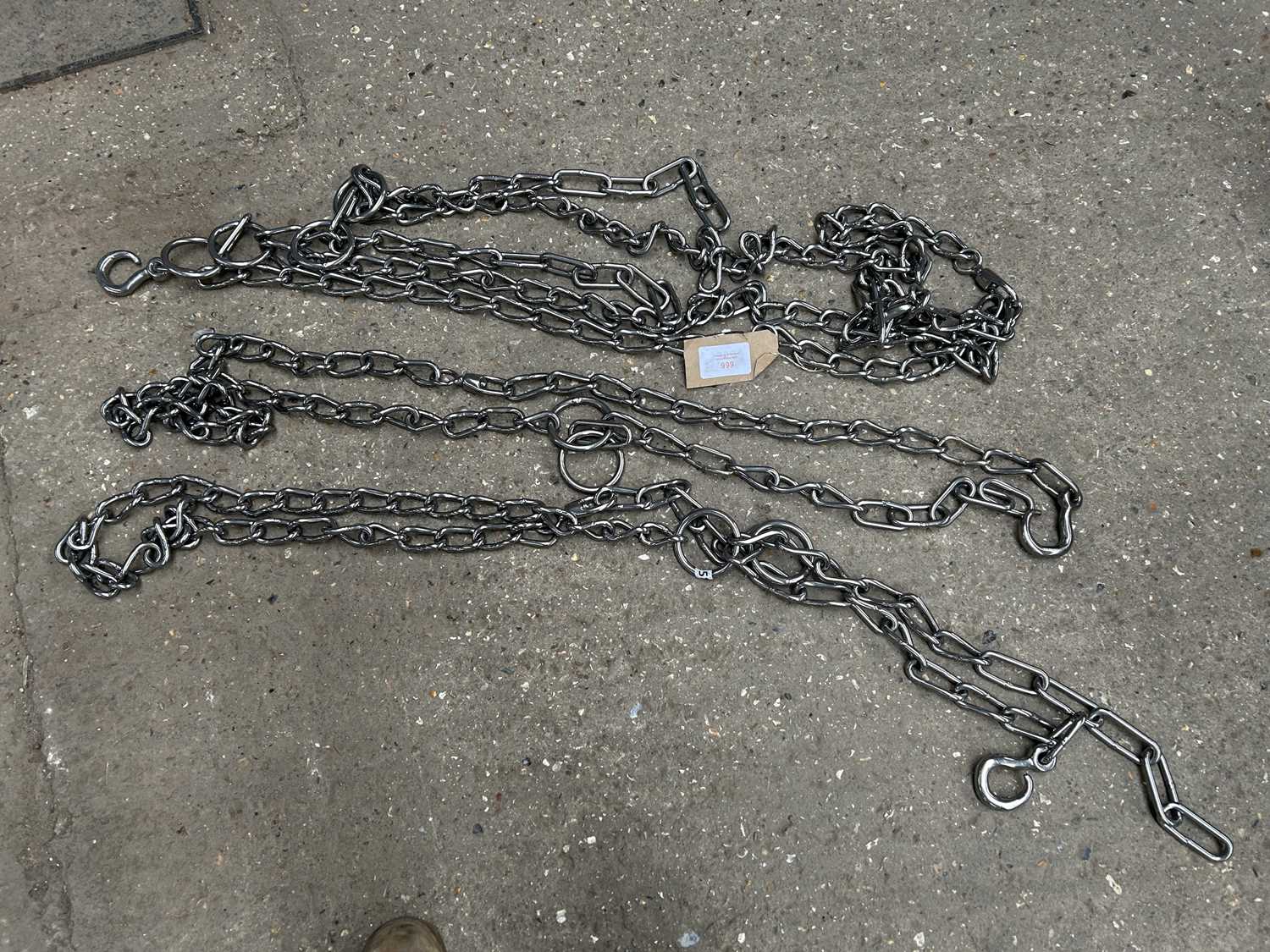 Lot 999 - Set of four dray chains in stainless steel.