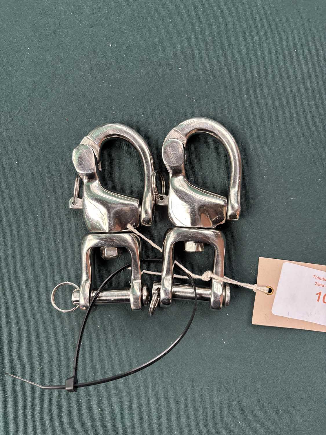Lot 1028 - Pair of stainless steel quick release snaps.