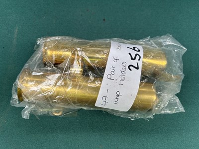 Lot 256 - Pair of brass whip holders