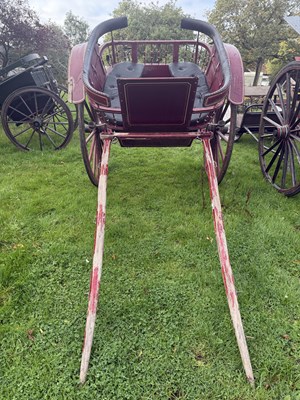 Lot 43 - GOVERNESS CART, Painted in burgundy with yellow lining and matching Burgundy undercarriage