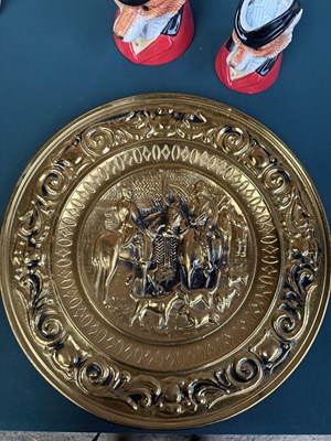 Lot 504 - 16" brass wall plaque embossed with hunting scene